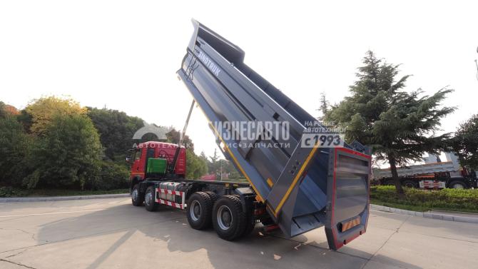 Купить Самосвал HOWO T5G 8x4 ( ZZ3317V386GE1 ) / 7.1*2.3*1.5+0.3 / 24-29 м3 / наклон / п.ч. 5.26 / Shandong в компании Русбизнесавто - изображение 1