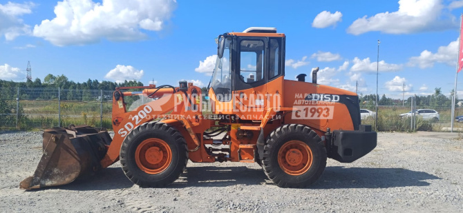 Купить Погрузчик фронтальный DOOSAN DISD, SD200 б/у (2014 г., 12 027 м.ч.)(0187) Кондиционер в компании Русбизнесавто - изображение 4