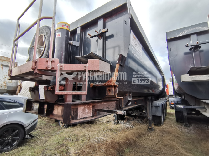 Купить Полуприцеп самосвальный Grunwald 9453-0000010-50 (31м3) б/у (2018 г.,1км.) в компании Русбизнесавто - изображение 0