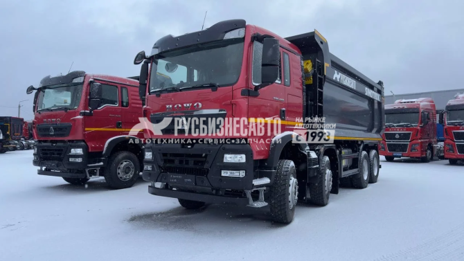 Купить Самосвал HOWO T5G 8x4 ( ZZ3317V306GE1 ) / 6.3*2.3*1.5+0.3 / 22-26 м3 / наклон / п.ч. 5.26 2025г.в. в компании Русбизнесавто - изображение 0