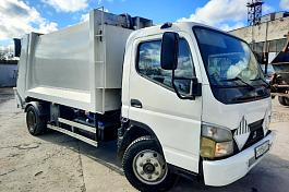 Мусоровоз на шасси FUSO 784604 с задней загрузкой б/у (2013 г., 173 002 км.)