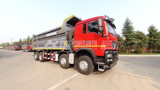 Купить Самосвал HOWO T5G 8x4 ( ZZ3317V386GE1 ) / 7.1*2.3*1.5+0.3 / 24-29 м3 / наклон / п.ч. 5.26 / Shandong в компании Русбизнесавто - изображение 0
