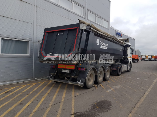 Купить Полуприцеп самосвальный Grunwald 9453-0000010-50 (31м3) б/у (2018 г., 3км.) в компании Русбизнесавто - изображение 0