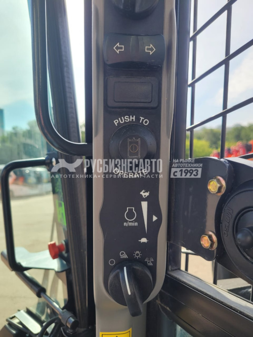 Купить Мини-погрузчик New Holland L323 б/у (2021 г.в. 1 468 м/ч)(Вилы+ковш+щётка) в компании Русбизнесавто - изображение 11