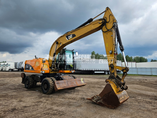 Купить Колесный экскаватор CAT M317D2 б/у (2014г; 18 527 м/ч)(0265) в компании Русбизнесавто - изображение 0